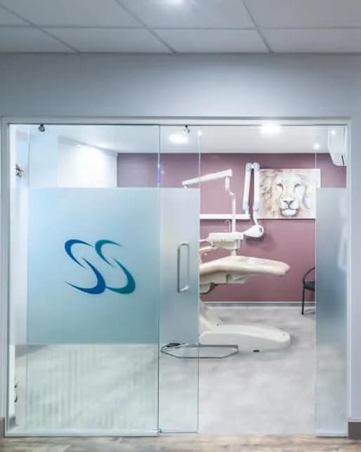 A glass-fronted treatment suite at Dental Works